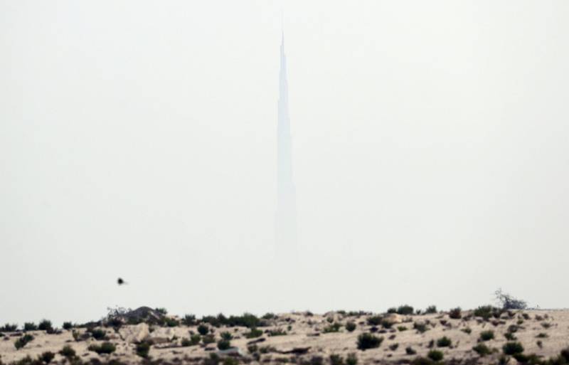 Dubai, United Arab Emirates - Reporter: N/A. News. Weather. The Burj Khalifa can barely be seen on a hazy overcast day in Dubai. Tuesday, March 16th, 2021. Dubai. Chris Whiteoak / The National
