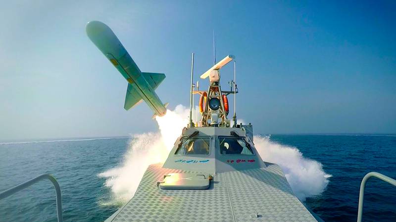 A missile is launched from a boat during a naval drill in the Arabian Gulf. AP