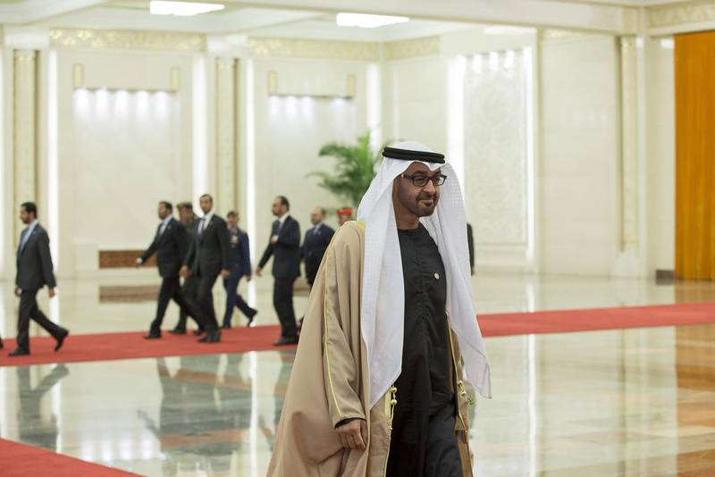 Sheikh Mohammed bin Zayed, Crown Prince of Abu Dhabi and Deputy Supreme Commander of the Armed Forces, is received by Xi Jinping, President of China (not shown), at the Great Hall of the People during a state visit to China. Ryan Carter / Crown Prince Court - Abu Dhabi
