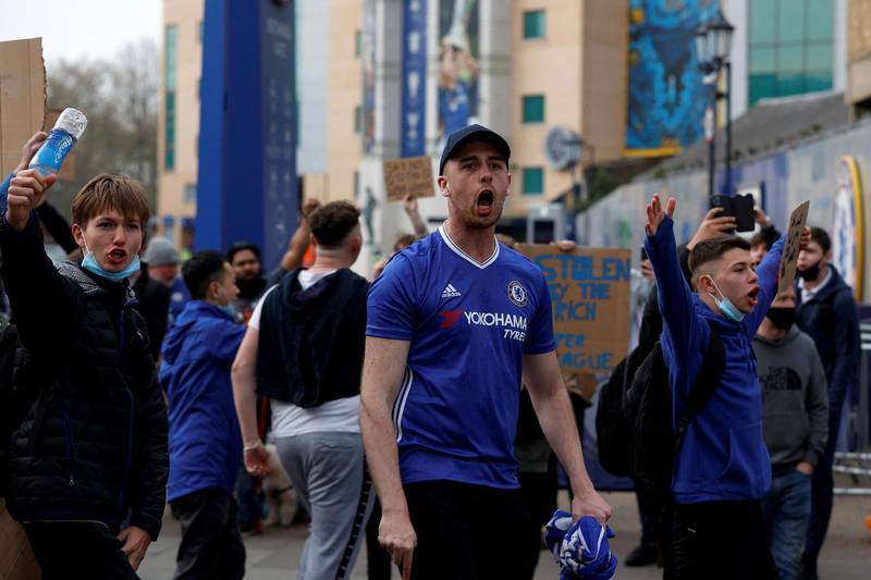 Football supporters demonstrate against the proposed European Super League outside Stamford Bridge. AFP