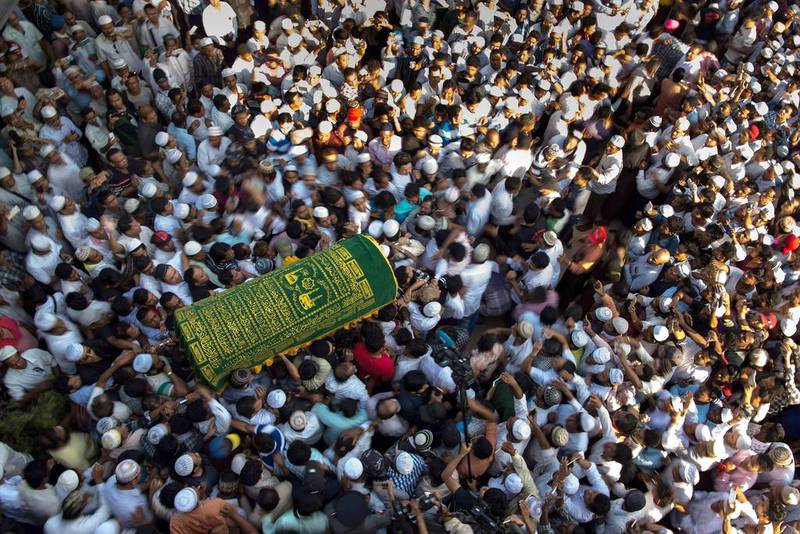 Mourners carry the coffin of Ko Ni, prominent Muslim lawyer who was shot dead at the Muslim cemetery in Yangon. Ye Aung Thu / AFP