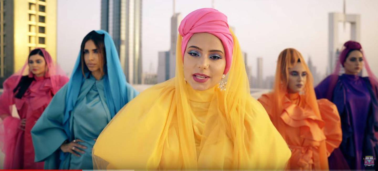 A screen grab of the colourful moment in which the video switches tone, and Haifa says it's time to 'speak up'