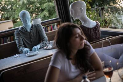 Mannequins are seen placed between tables to help customers adhere to new restaurant social distancing rules at Varuna Gezgin restaurant in Istanbul, Turkey. Getty Images