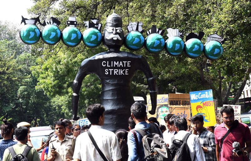 Indian activists and students gather for a protest against climate change in New Delhi, India. EPA