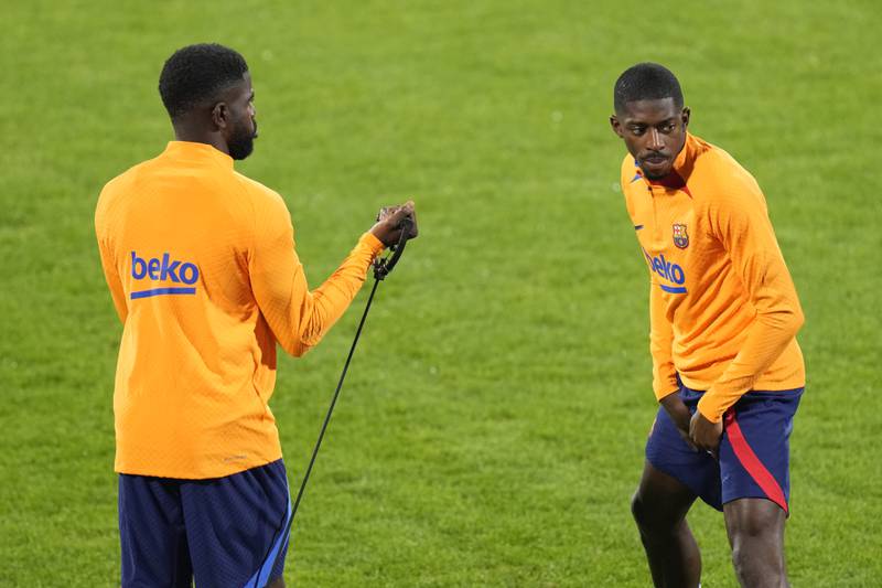 Barcelona's Ousmane Dembele, right, and Samuel Umtiti. AP Photo
