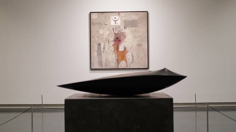 The Last Sound (1964) by Ibrahim El-Salahi behind Armen Agop’s untitled bronze piece from 2008. Photo: Barjeel Art Foundation