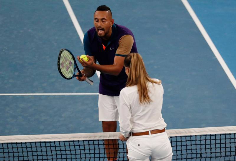 Nick Kyrgios speaks with umpire Marijana Veljovic after complaining about the net call. Reuters