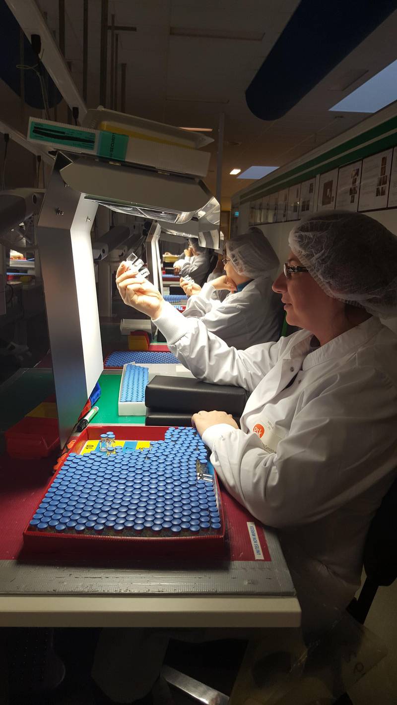 Scientists test the latest batch of vaccines to pass through the GlaxoSmithKline manufacturing plant in Wavre, near Brussels, Belgium. Courtesy GSK
