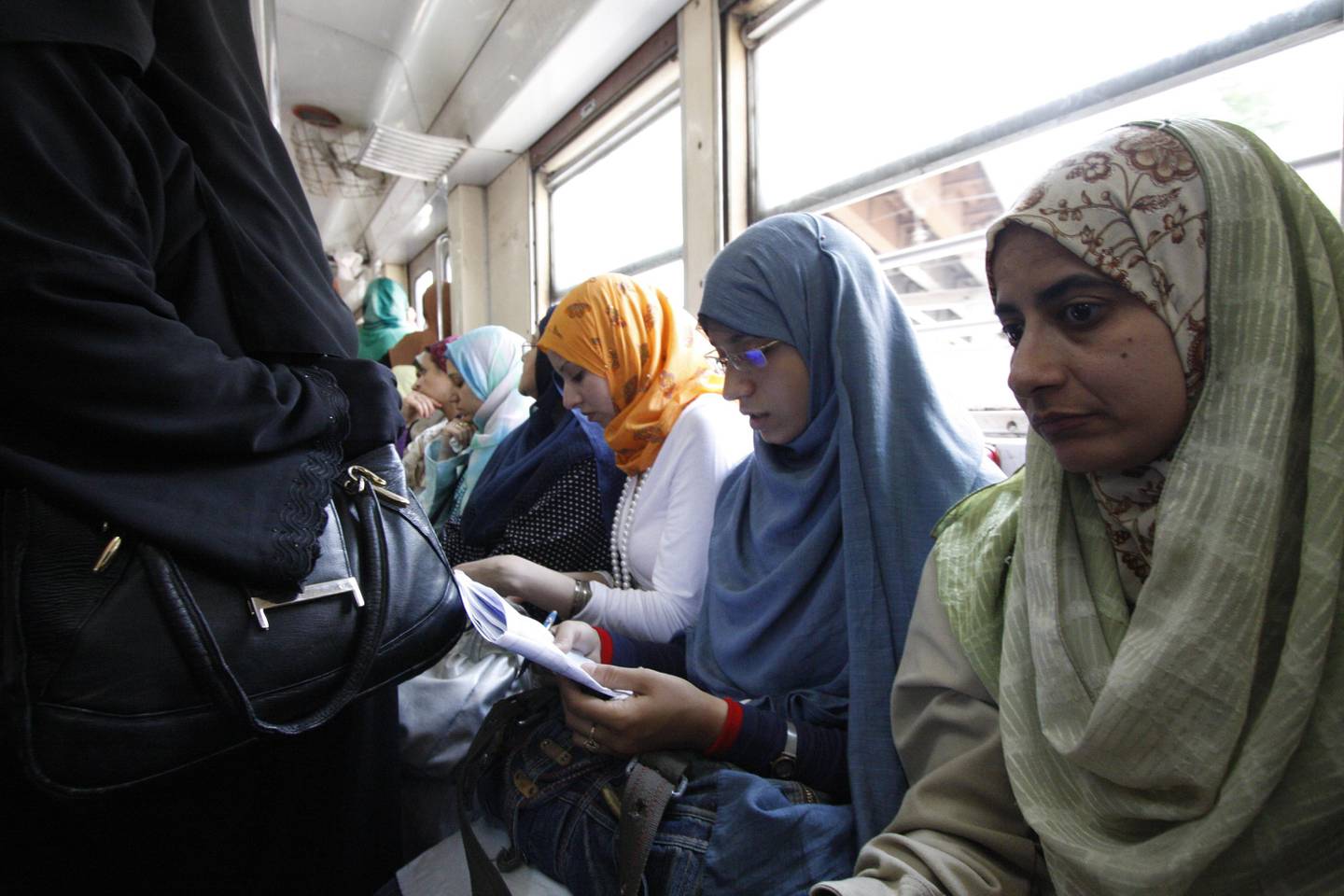 Women ride the Cairo metro in the women only car on May 18, 2008.