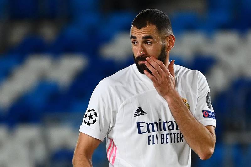 Real Madrid's French forward Karim Benzema reacts at the end of the natch. AFP