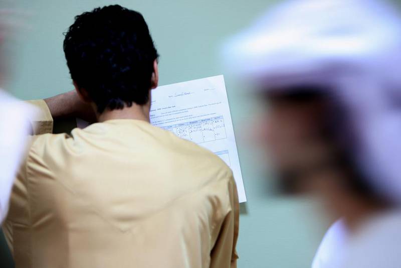 An Emirati student looking for a job during a career fair held at the Men’s Dubai College. A survey published this week by jobs website Bayt and YouGov showed most Emiratis still regard government jobs as more desirable. Paulo Vecina / The National