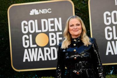 epa09043754 Handout image released by the Hollywood Foreign Press Association showing Amy Poehler arriving for the 78th annual Golden Globe Awards ceremony at the Beverly Hilton Hotel, in Beverly Hills, California, USA, 28 February 2021.  EPA/HFPA / HANDOUT EDITORIAL USE ONLY, NO SALES