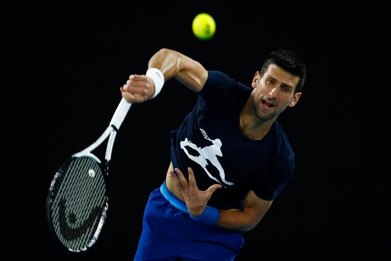 Novak Djokov hits a serve during a practice session ahead of the 2022 Australian Open at Melbourne Park. Getty Images