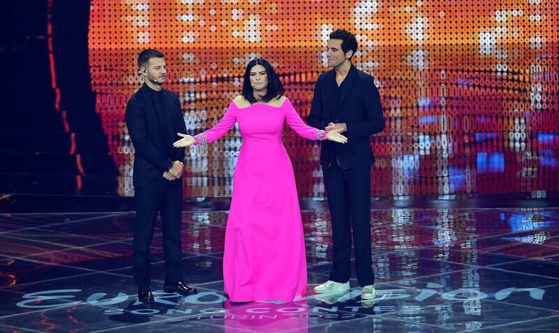 Semi-final hosts Alessandro Cattelan, Laura Pausini and Lebanese-British singer Mika. EPA