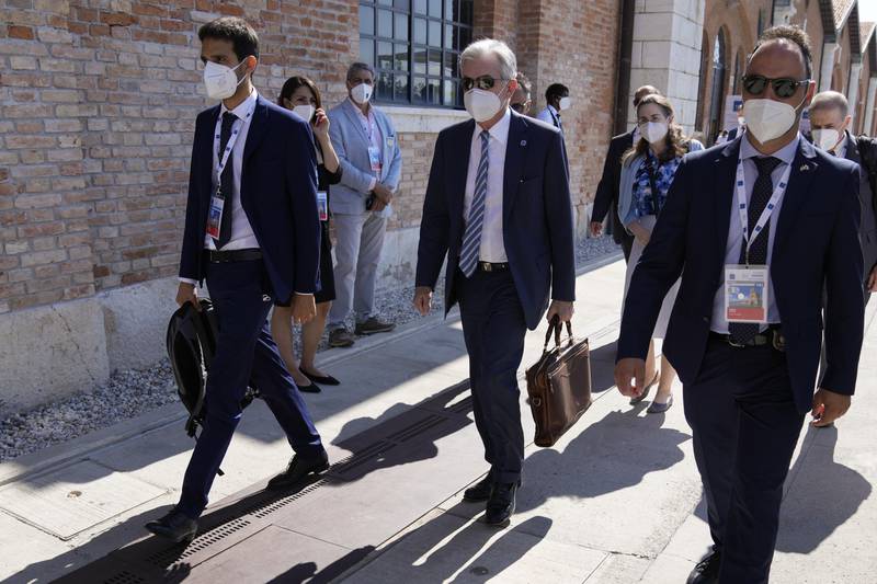 US Federal Reserve Board chairman Jerome Powell, centre, arrives in Venice