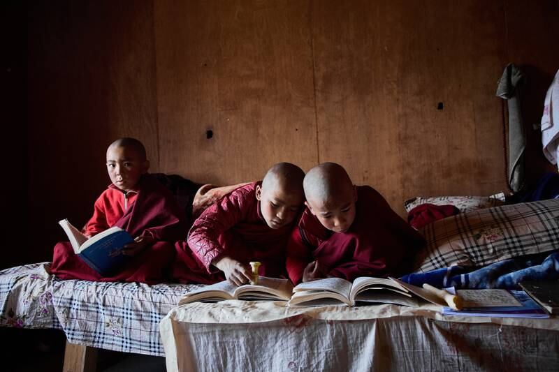 Novice monks in the Thame valley in Nepal's Khumbu region, home of the Sherpa peoples, who were led to the valley by a Buddhist lama. He spent time meditating in a remote mountain cave, where a friendly yeti is said to have brought him food and water 