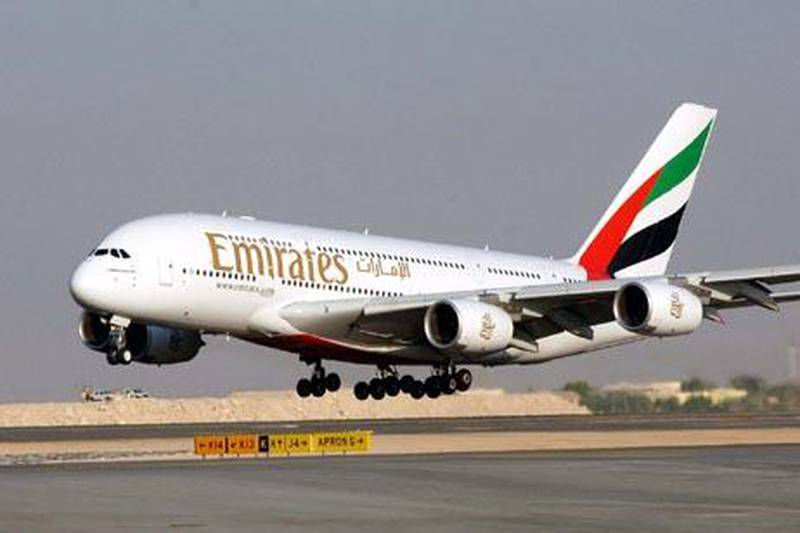 File - In this Nov. 21, 2005 file photo, an Airbus A380 of Emirates Airlines take off for a demonstration flight during the Air show, in Dubai, United Arab Emirates. Emirates airline, the biggest buyer of the "superjumbo" Airbus A380, said Wednesday, Nov. 11, 2009, it is considering increasing its order for the double-decker plane despite delays on existing orders. (AP Photo/Aziz Shah, file)