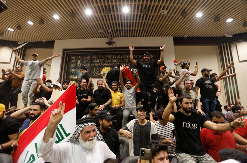 Protesters demonstrate inside the Parliament building. Reuters