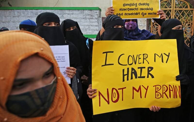 Dozens of women have been protesting for weeks in a dispute that started when a college said students wearing the hijab were breaking dress policy. EPA