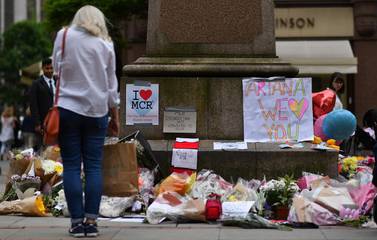 Floral tributes at Albert Square in Manchester, placed to commemorate the victims of the terrorist attack at the Manchester Arena on May 22, 2017. AFP