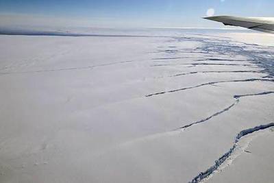 The Pine Island Glacier Ice Shelf is the site of a mission to measure the polar ice's temperature. Michael Studinger / Nasa
