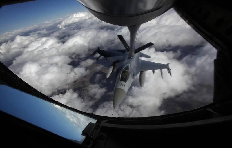 An F-16 refuels in mid-flight during an exercise in the US. AP