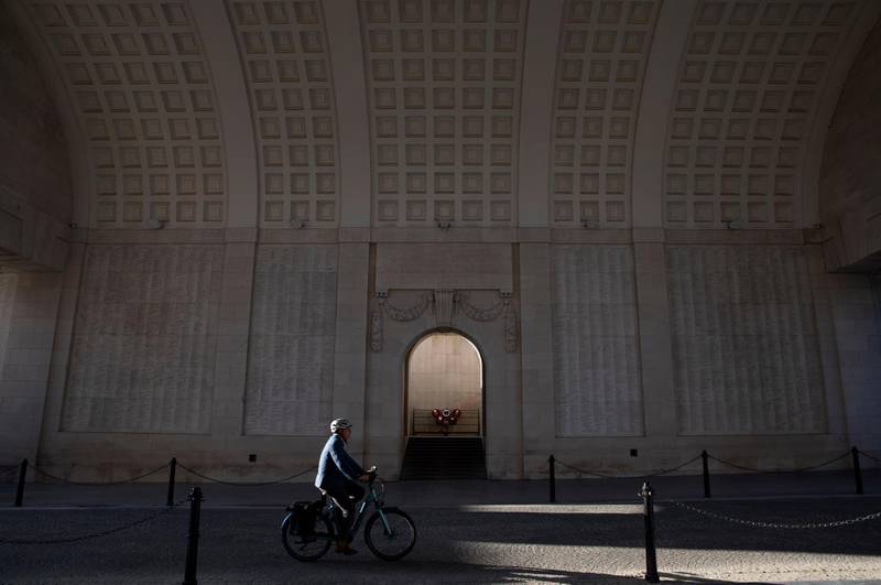 A man cycles under the First World War monument, Menin Gate, in Ypres, Belgium last Saturday. AP Photo