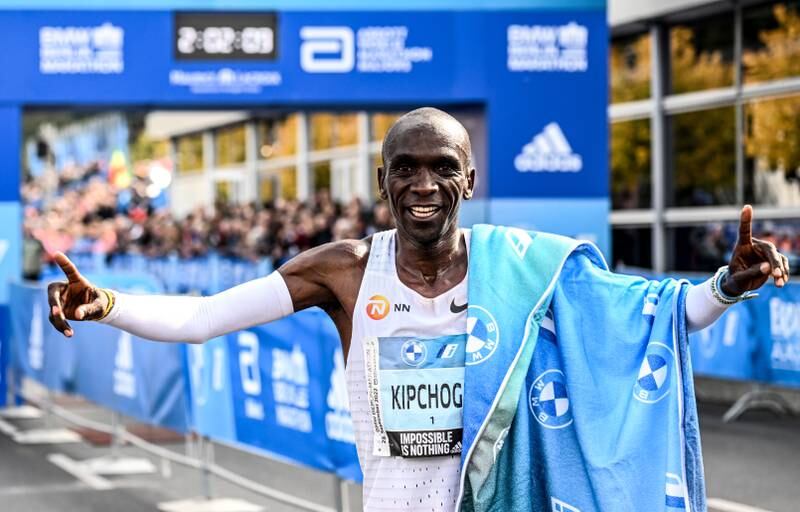 Eliud Kipchoge celebrates after winning the Berlin Marathon with a new world record time. EPA