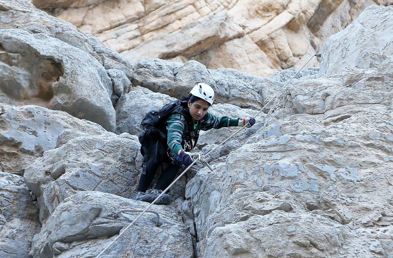 RAS AL KHAIMAH , UNITED ARAB EMIRATES – Dec 14 , 2016 : Afshan Ahmed doing the Via Ferrata and Zip Line experience operated by Absolute Adventure at the Jebel Jais mountain in Ras Al Khaimah. ( Pawan Singh / The National ) For Arts & Life. Story by Afshan Ahmed. ID No -  38214 *** Local Caption ***  PS1412- ZIP LINE06.jpg