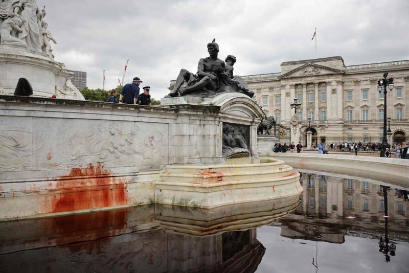 Red stains on the Queen Victoria Memorial in London, where Extinction Rebellion continued  their latest round of protests, promising two weeks of disruption. AFP