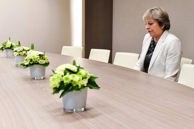 Theresa May waits for the arrival of European Council President Donald Tusk prior to a bilateral meeting in Brussels. AP Photo
