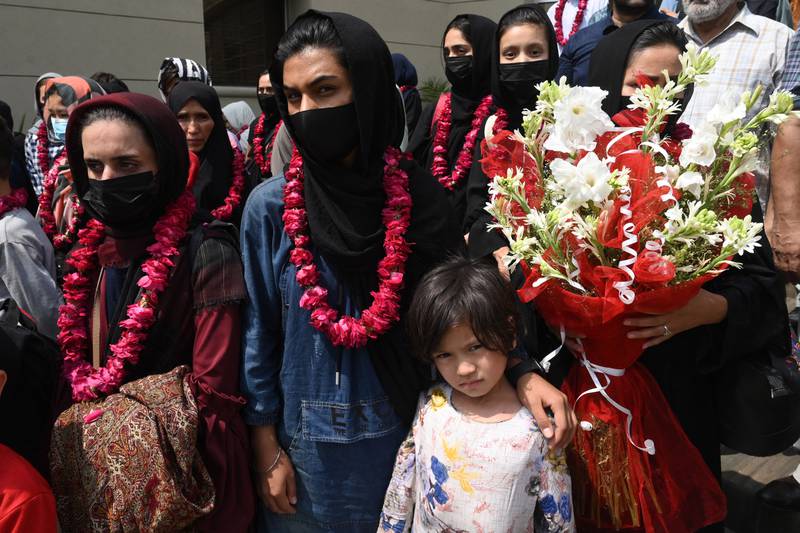 Members of Afghanistan's national girls football team arrive at the Pakistan Football Federation in Lahore on September 15, 2021, a month after the hardline Taliban swept back into power. AFP