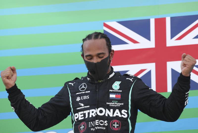 Lewis Hamilton celebrates after his victory in the Spanish Grand Prix on Sunday, August 16. EPA