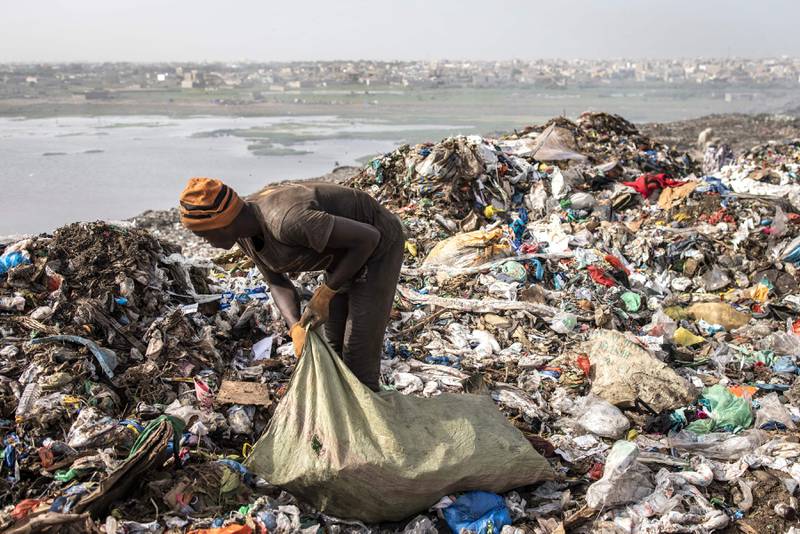 Waste pickers need better working conditions for a sustainable economy to work, one expert said. AFP