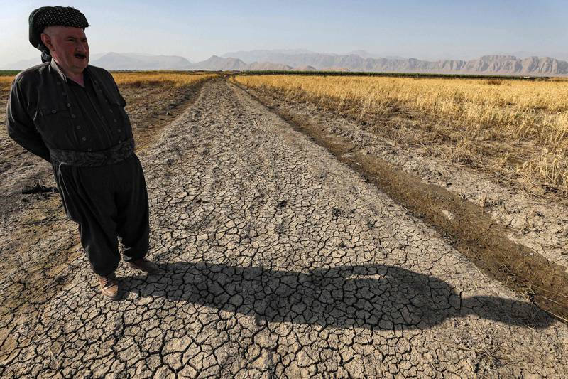 Bapir Kalkani, 56, farms near the picturesque lake but has seen marked changes over the past three years as Iraq suffers prolonged drought. "There was water where I'm standing now" in 2019, he says. "It used to go three kilometres further, but the level has retreated."