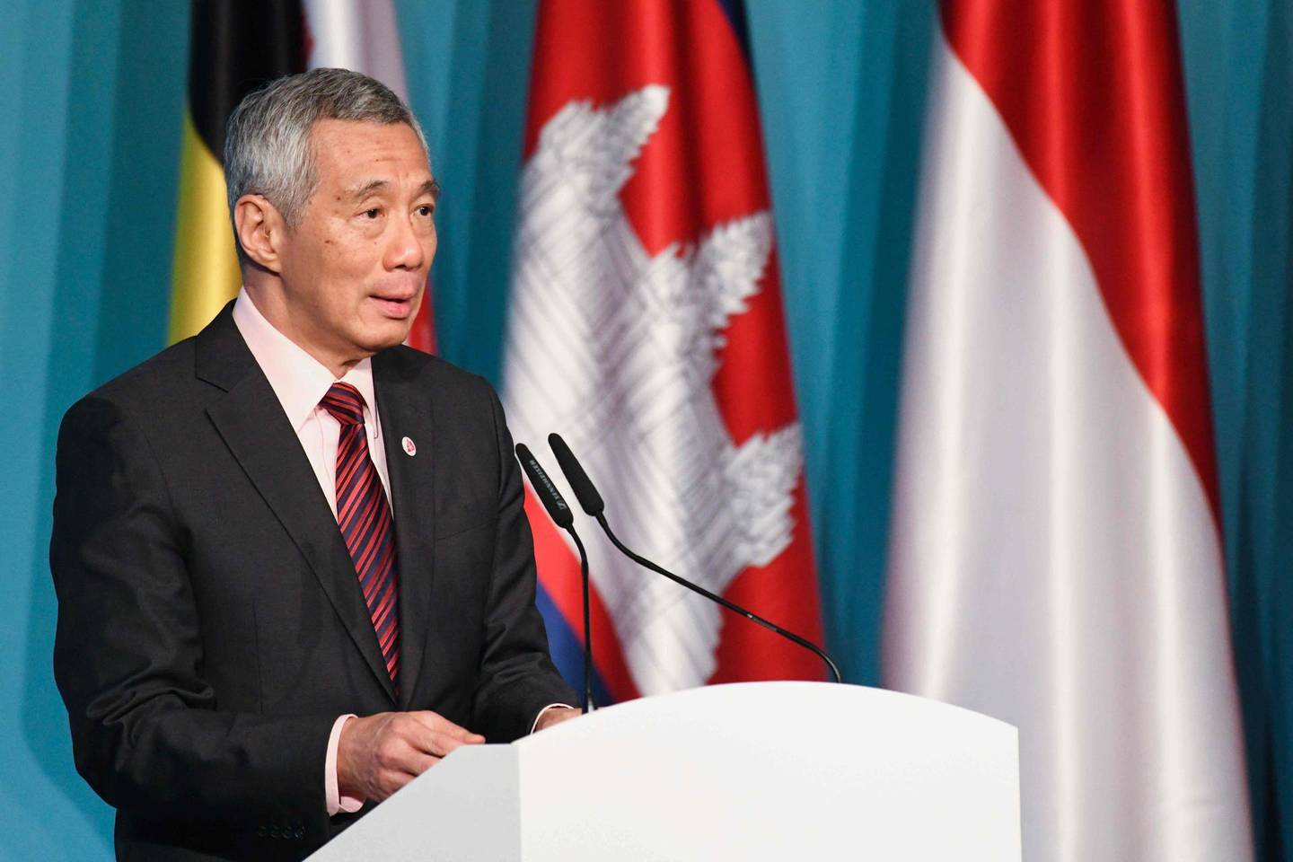 Singapore Prime Minister Lee Hsien Loong speaks during a press conference at the 32nd ASEAN (Association of Southeast Asian Nations) Summit in Singapore on April 28, 2018. / AFP PHOTO / ROSLAN RAHMAN