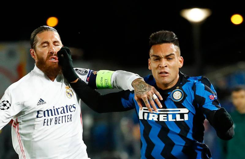 Real Madrid's Sergio Ramos in action with Inter Milan's Lautaro Martinez. Real won the Champions League group match 3-2 on November 3. Reuters