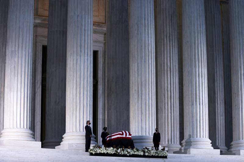 WASHINGTON, DC - SEPTEMBER 23: Members of the public pay respects to Associate Justice Ruth Bader Ginsburg as her flag-draped casket rests on the Lincoln catafalque on the west front of the U.S. Supreme Court September 23, 2020 in Washington, DC. A pioneering lawyer and according the Chief Justice John Roberts 'a jurist of historic stature,' Ginsburg died September 18 at the age of 87 after a long battle against cancer.   Alex Wong/Getty Images/AFP
== FOR NEWSPAPERS, INTERNET, TELCOS & TELEVISION USE ONLY ==
