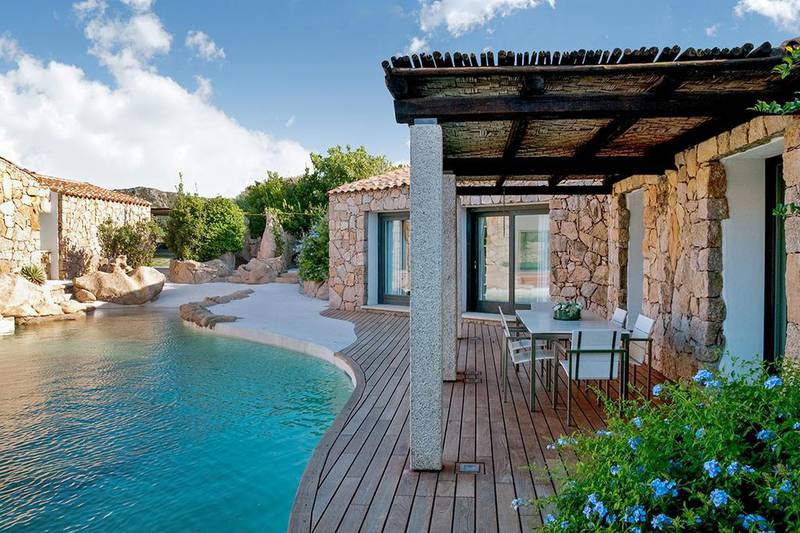 Villa Amoras comprises several buildings that surround a courtyard around a part of the pool. Courtesy Beauchamp Estates