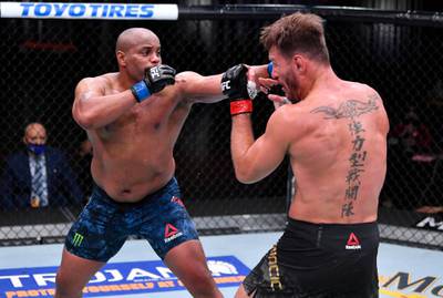 LAS VEGAS, NEVADA - AUGUST 15: (L-R) Daniel Cormier punches Stipe Miocic in their UFC heavyweight championship bout during the UFC 252 event at UFC APEX on August 15, 2020 in Las Vegas, Nevada. (Photo by Jeff Bottari/Zuffa LLC)
