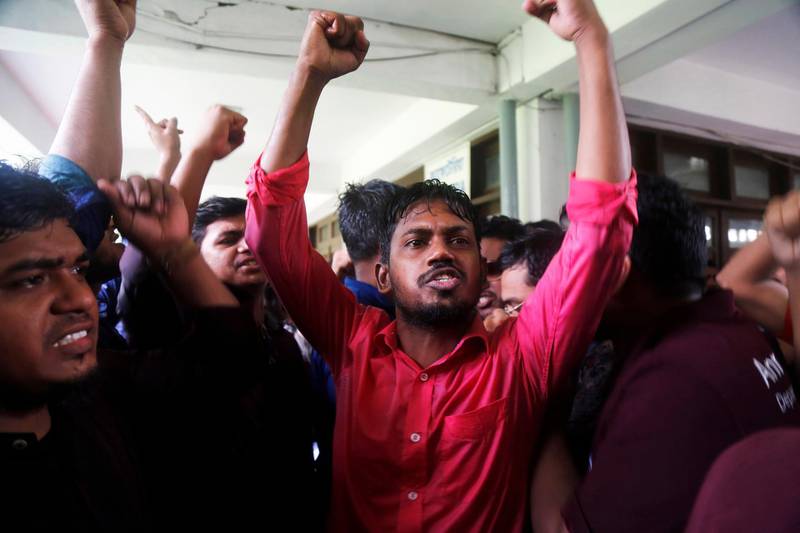 epa07903393 Dhaka University students take part in a protest after a fellow student was found dead, at Dhaka University campus in Dhaka, Bangladesh, 07 October 2019. According to the local media report, second year student of Bangladesh University of Engineering and Technology (BUET) Abrar Fahad was found after reportedly beaten to death in front of Sher-eBangla hall at Dhaka University.  EPA/MONIRUL ALAM
