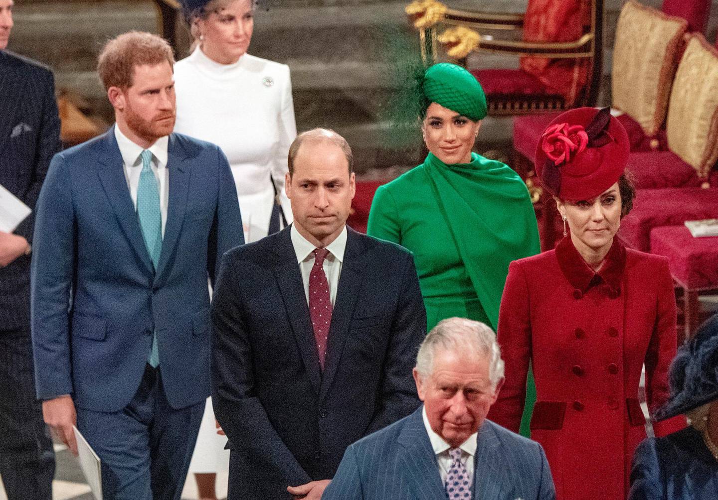 FILE - In this file photo dated Monday March 9, 2020, members of Britain's royal family, with Prince Charles in foreground, followed by Prince William with Kate Duchess of Cambridge, and Prince Harry with Meghan Duchess of Sussex, as they leave the annual Commonwealth Service at Westminster Abbey in London. Britain's Queen Elizabeth II and other members of the royal family along with various government leaders and guests attended the annual Commonwealth Day service, the largest annual inter-faith gathering in the United Kingdom.  The princeâ€™s Clarence House office reported on Wednesday, March 25, 2020 that the 71-year-old Prince Charles is showing mild symptoms of COVID-19 and is self-isolating at a royal estate in Scotland, also saying his wife Camilla has tested negative. (Phil Harris / FILE via AP)