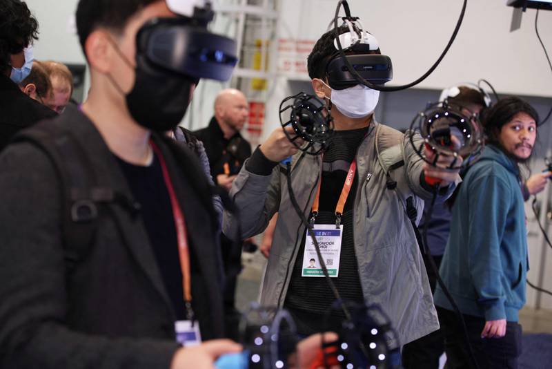 People play virtual reality video games during the Consumer Electronics Show in Las Vegas, earlier this month. AFP