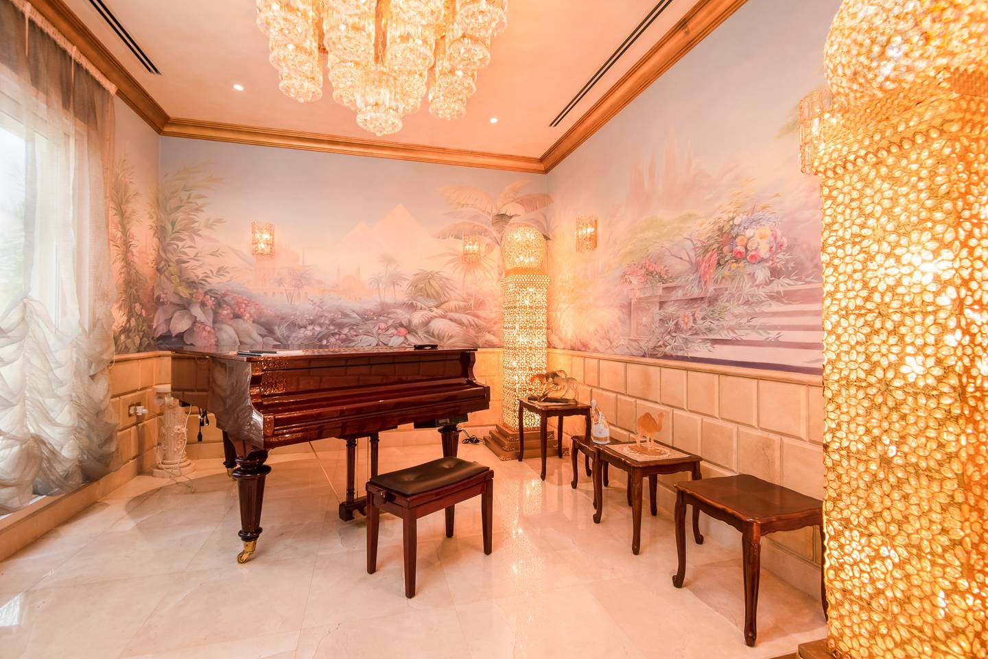 A music room with ornate wallpaper. Photo: Engel and Voelkers