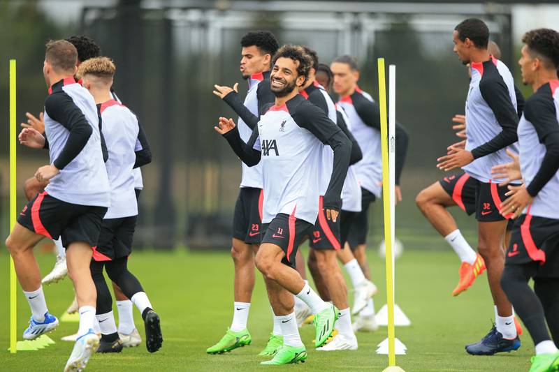Liverpool's Mohamed Salah smiles as he takes part in a training session with teammates on Tuesday, September 6, 2022, on the eve of their Champions League match against Napoli. AFP