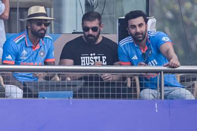 India all-rounder Hardik Pandya, left, Bollywood actors John Abraham, centre, and Ranbir Kapoor at the Wankhede Stadium in Mumbai. AFP