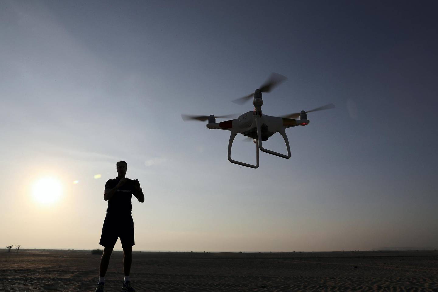 DUBAI , UNITED ARAB EMIRATES ,  November 22 , 2018 :- Patrick Bol ( rower ) learning how to use drones in the desert for Atlantic tour near the Al Warsan Pet Market in Dubai. His team will be using drones for filming during the challenge. ( Pawan Singh / The National )  For News. Story by Nick Webster 
