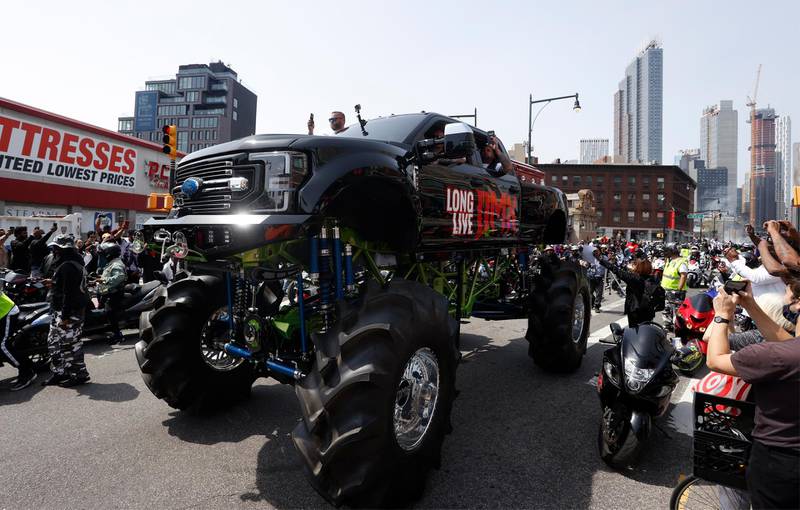 The casket of DMX is seen on a monster truck on Flatbush avenue outside the Barclays Centre where a private memorial for the US rapper was held in Brooklyn, New York, on Saturday, April 24. EPA