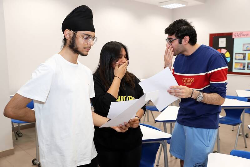 Left to right: Kabir Singh Pujji, Trisha Agarwal and Bhumit Singh are excited after receiving their IB results.