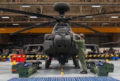 One of the British Army's new AH-64E Apache attack helicopters goes on display at Wattisham Airfield, in Suffolk, eastern England. All photos: PA